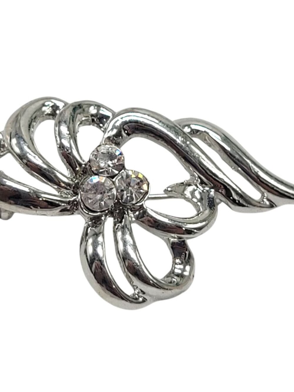 Vintage Silver-Tone Floral Brooch With Rhinestone Accents Elegant Openwork Desig